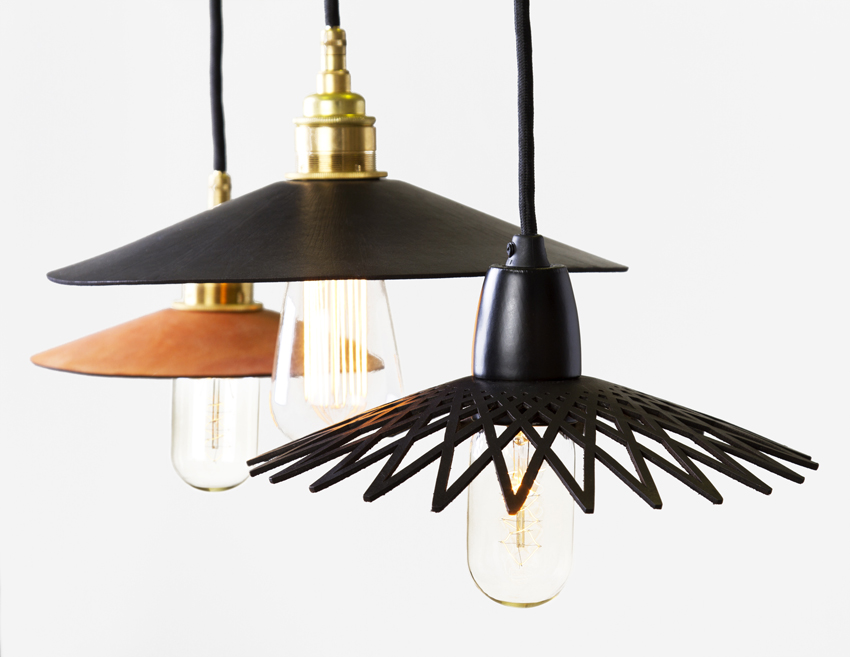 Hide pendant lights by Anaesthetic with individually cut leather shades.