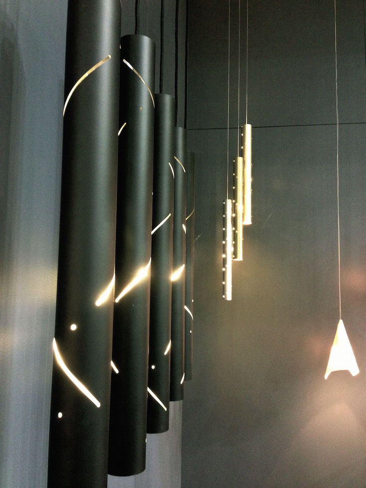Ilanel’s stunning cylindrical Black Rain and Rain pendants with their tiny stars of light at DesignEX13, Melbourne. More on the RSD Blog.