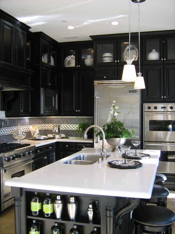 Ornate shaker-style #black kitchen with detailed mouldings and furniture. From The #Monochrome #Kitchen, the RSD Blog.