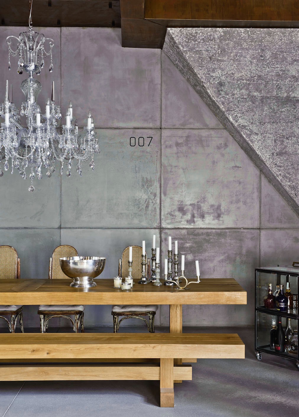 Yummy walls in this eclectic loft apartment in Budapest by Shay Sabag. More #concrete on the blog.